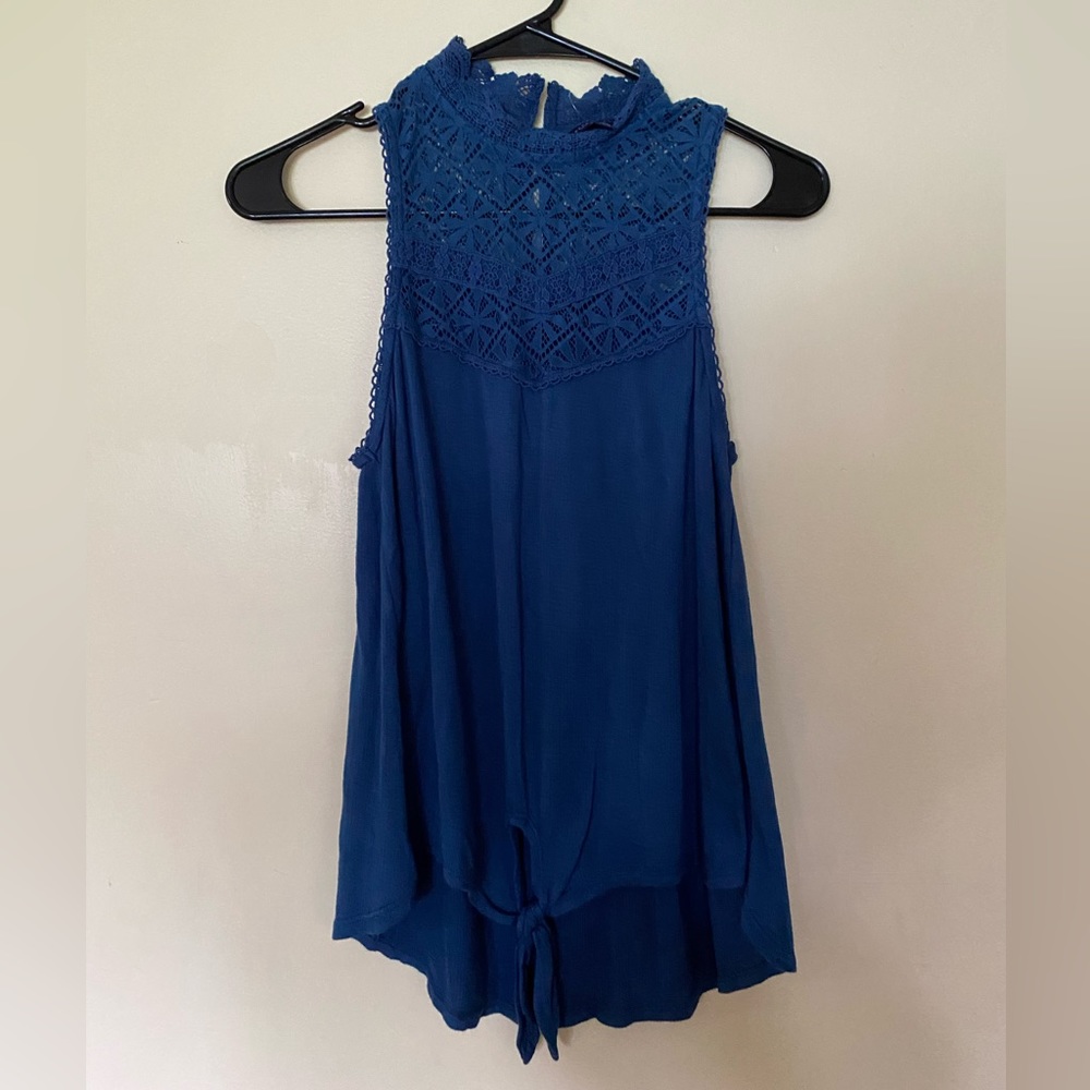 Aeropostale blue lace top, buttons on back neck area and bottom tie. Size M